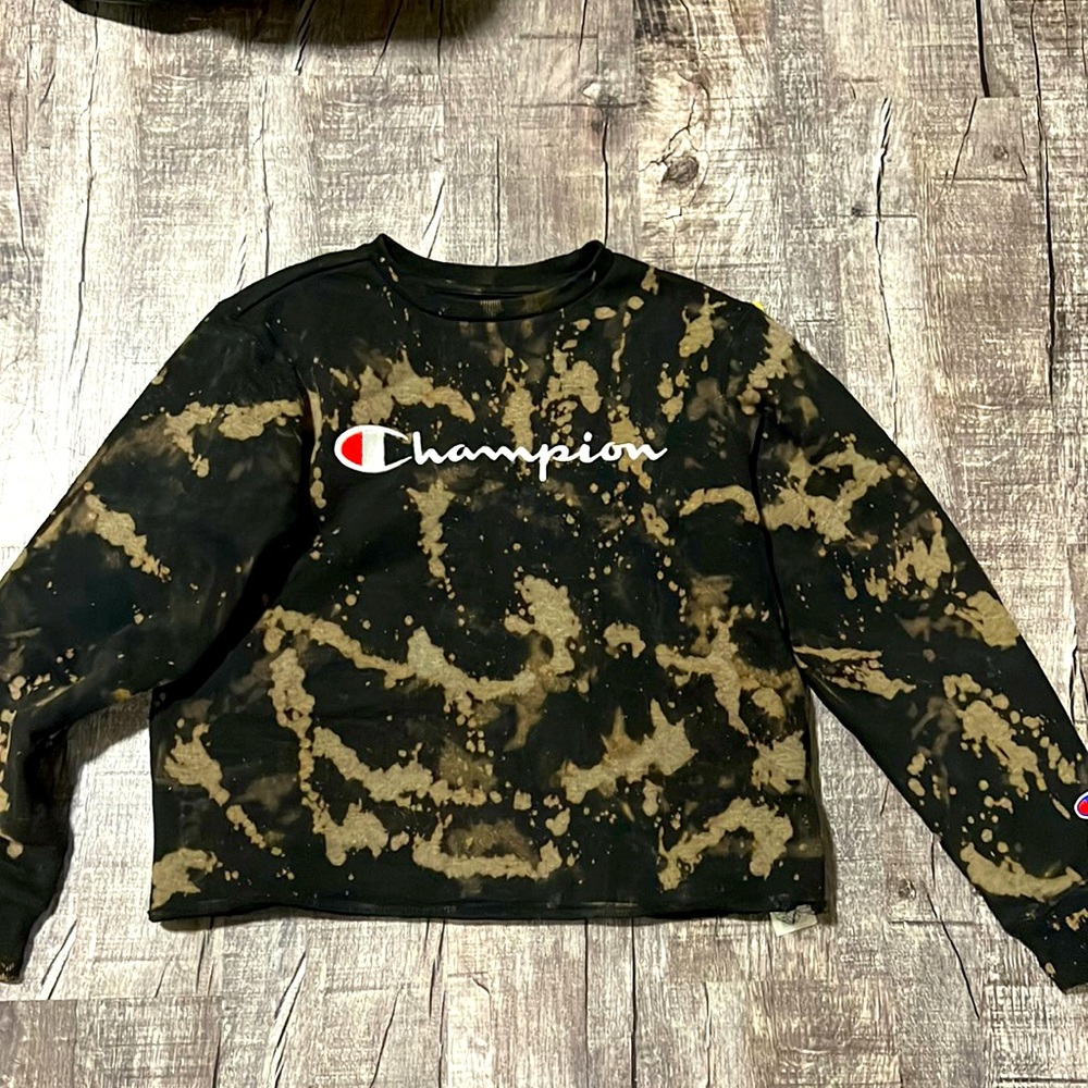 I have here a girls/juniors sz L sweater. may have been cut to shorten length.
